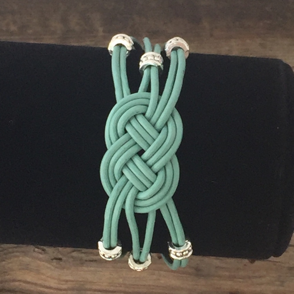 Turquoise leather Celtic knot bracelet. Size 71/2”
